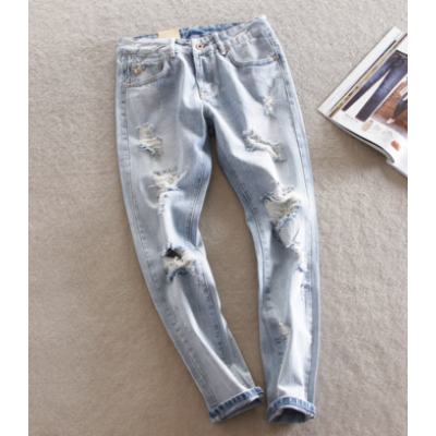 Стильні рвані джинси 13892 Стильні рвані джинси 13892