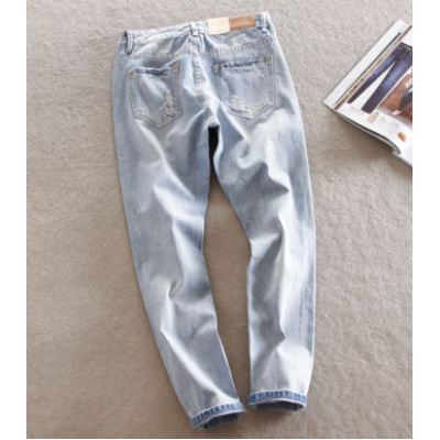 Стильні рвані джинси 13892 Стильні рвані джинси 13892